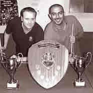 Two team members with their awards.