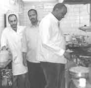 Staff in the Awrfuul kitchens.