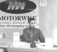 A member of staff working at their desk.