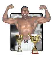 Body Builder Lloyd Stuart proudly displays his trophies and muscles. (see 'A Real Natural Champion' for details).