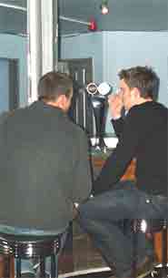 Customers at the bar.