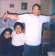 Photo of Hilarian and kids.