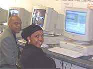 Ali and Saiya sat in front of computers.