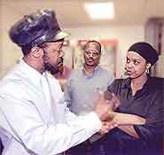 Levi talks to Saiya at the internet caf&eacute;.