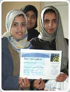 Students receive their certificates.