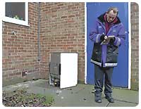 Community Warden Frank and an abandoned fridge.