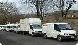 Arnold Clarke vans parked on Abbeyfield Road.