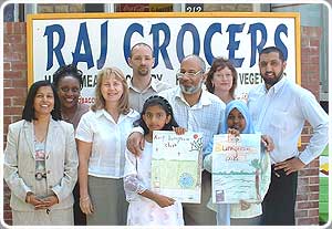 Nasra Abdillahi-Ahi and Sherish Nawaz with their posters.